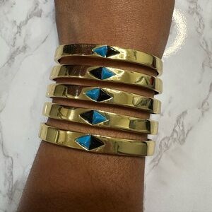 House of Harlow 1960 Gold Bangles with Blue and Black Accents